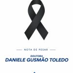 Nota de pesar da SOCERJ pelo falecimento da Dra. Daniele Gusmão Toledo, com laço preto de luto.